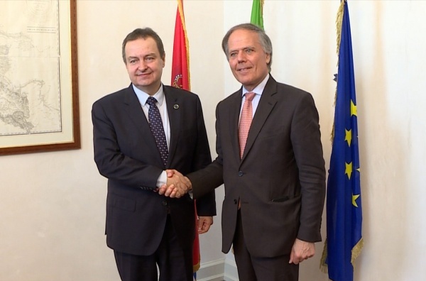 Ivica Dacic, left, and Enzo Milanesi