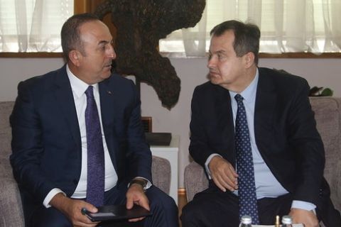 Mevlut Cavusoglu, left, and Ivica Dacic