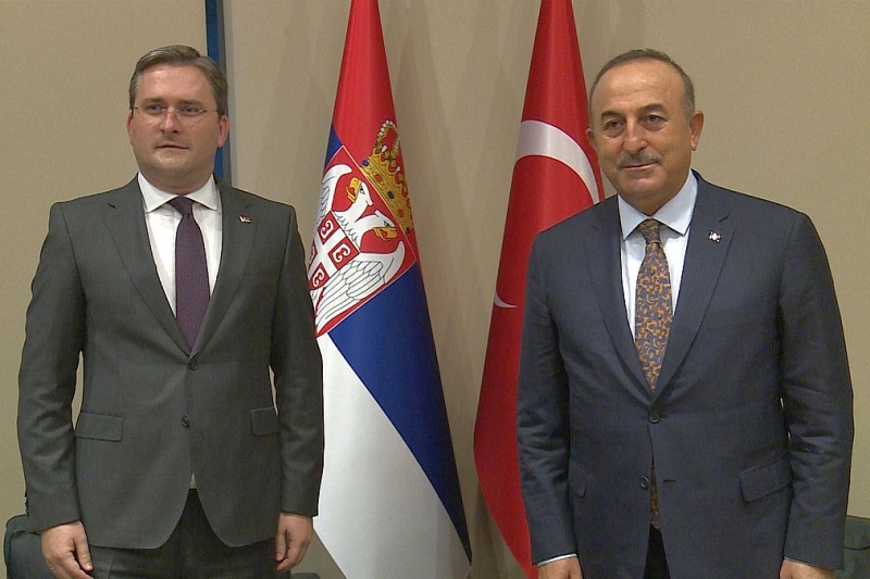 Nikola Selakovic, left, and Mevlut Cavusoglu