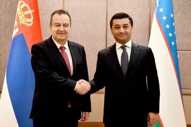 Ivica Dacic, left, and Bakhtiyor Saidov